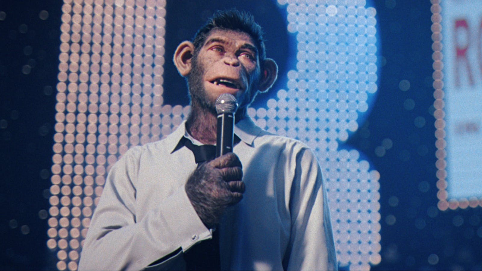 Robbie Williams’s Ego Lands Well in the Spirited Biopic ‘Better Man’